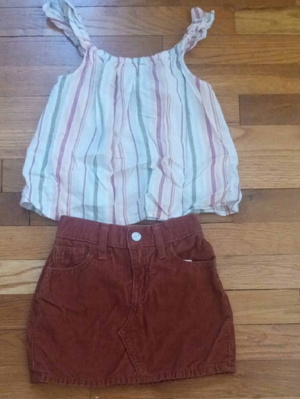 girl 5 stiped tank and rust orange skirt